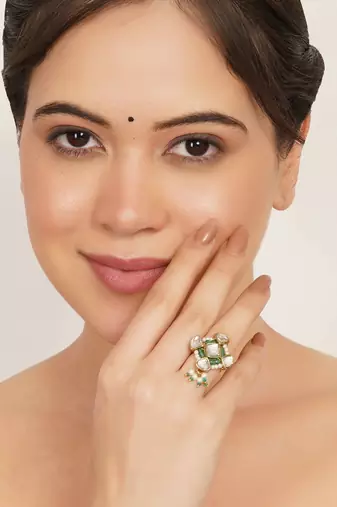 green alloy ring with kundan pearl floral work