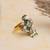 green alloy ring with kundan pearl floral work