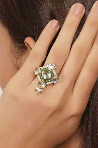 green alloy ring with kundan pearl floral work