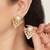 white brass studs with pearl geometric work