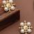 white brass earrings with pearl geometric work