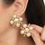 white brass earrings with pearl geometric work