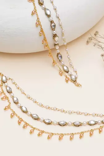 gold alloy hair chain with kundan pearl layered work