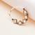 purple alloy nose ring with kundan work design