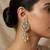 white alloy earrings with kundan pearl layered chandelier
