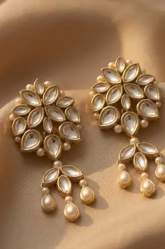 white alloy earrings with kundan pearl layered chandelier