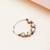 purple alloy nose ring with kundan work design
