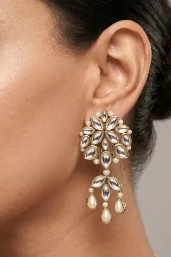 white alloy earrings with kundan pearl layered chandelier