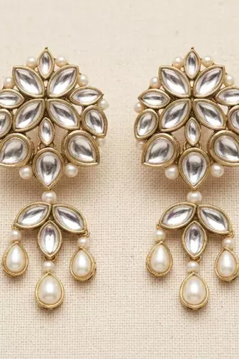 white alloy earrings with kundan pearl layered chandelier