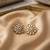 white alloy studs with kundan sunflower floral work