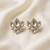 white alloy studs with kundan lotus floral work
