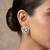 white alloy studs with kundan lotus floral work