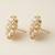 white alloy studs with kundan sunflower floral work