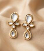 white alloy earrings with kundan pearl drop floral work