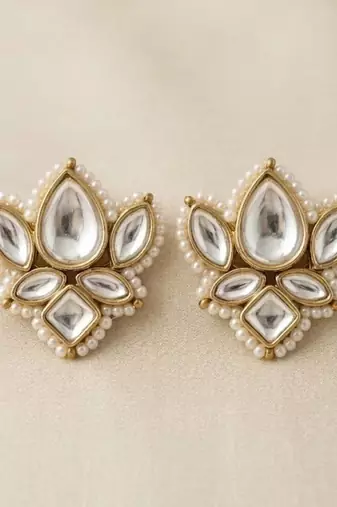 white alloy studs with kundan lotus floral work