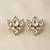 white alloy studs with kundan lotus floral work