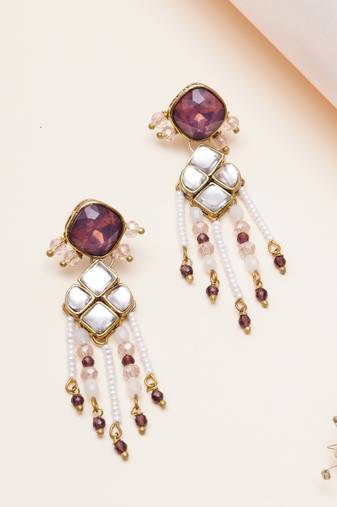 purple alloy earrings with kundan pearl work design