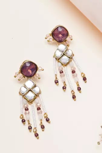 purple alloy earrings with kundan pearl work design