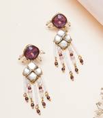 purple alloy earrings with kundan pearl work design
