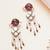 purple alloy earrings with kundan pearl work design