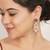 purple alloy earrings with kundan pearl work design