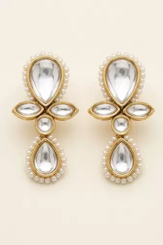 white alloy earrings with kundan pearl drop floral work