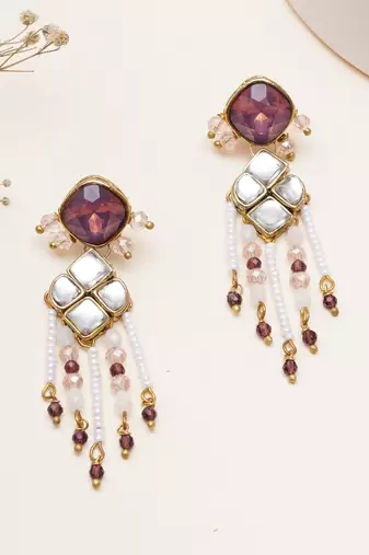 purple alloy earrings with kundan pearl work design