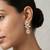 white alloy earrings with kundan pearl drop floral work