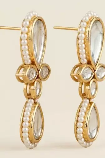 white alloy earrings with kundan pearl drop floral work