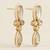 white alloy earrings with kundan pearl drop floral work