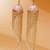 pink alloy jhumkas with meenakari chain bead work design
