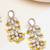 white alloy earrings with pearl tiered chandelier work