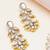 white alloy earrings with pearl tiered chandelier work