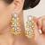 white alloy earrings with pearl tiered chandelier work