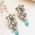 blue alloy earrings with kundan mint floral drop work