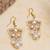 white alloy earrings with kundan lotus pearl work