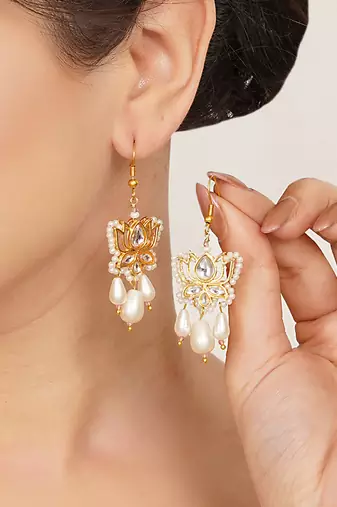 white alloy earrings with kundan lotus pearl work