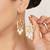 white alloy earrings with kundan lotus pearl work