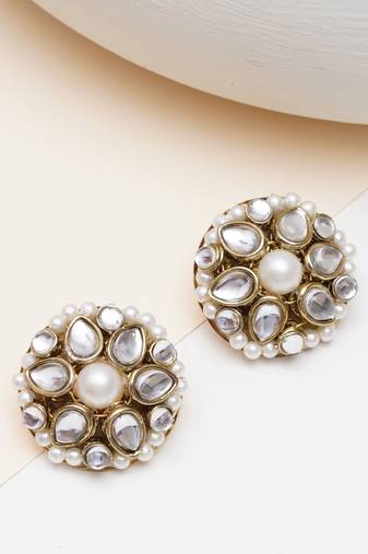 white alloy earrings with mini kundan flower work