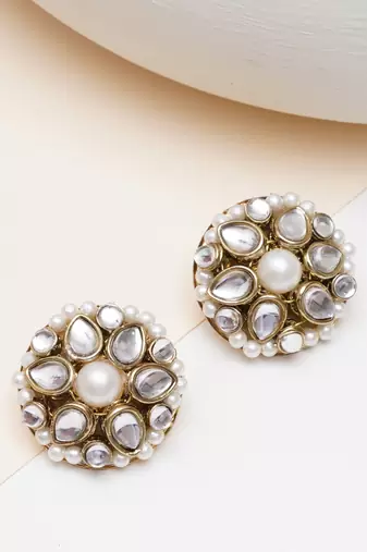 white alloy earrings with mini kundan flower work