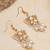white alloy earrings with kundan lotus pearl work