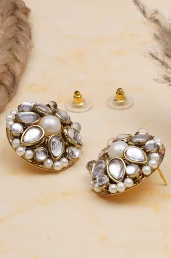 white alloy earrings with mini kundan flower work