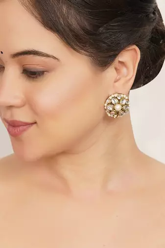 white alloy earrings with mini kundan flower work