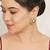 white alloy earrings with mini kundan flower work