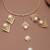 golden brass necklace set with pearl geometric design