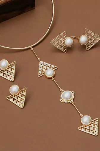 golden brass necklace set with pearl geometric design