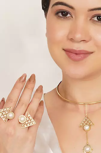 golden brass necklace set with pearl geometric design
