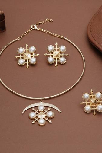 gold brass necklace set with pearl crescent design
