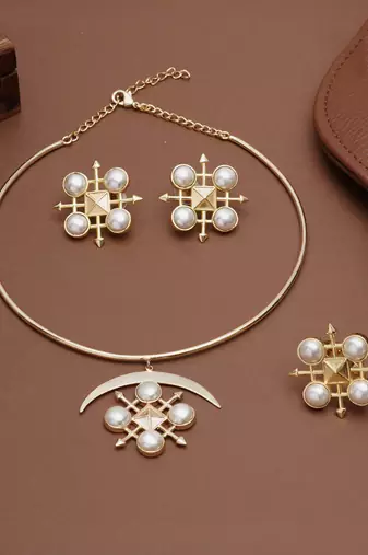 gold brass necklace set with pearl crescent design