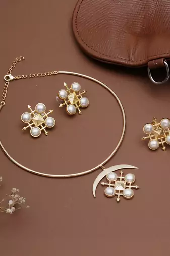 gold brass necklace set with pearl crescent design